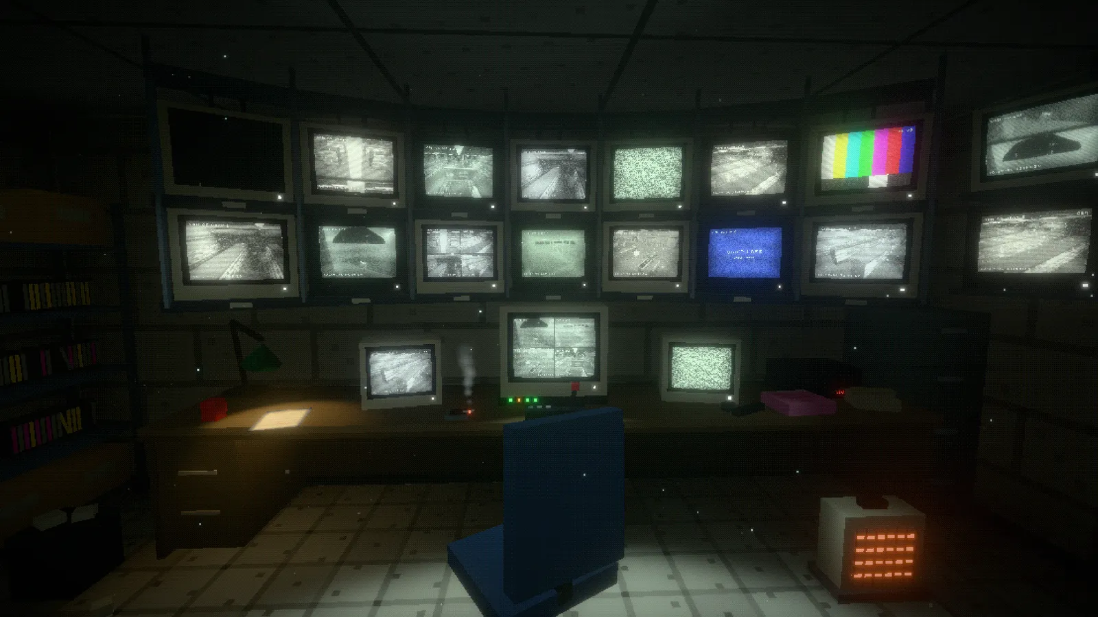 Security office with a wall of CCTV monitors